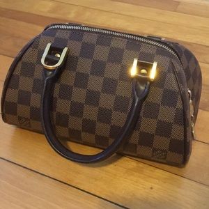 Authentic Louis Vuitton Rivera Purse